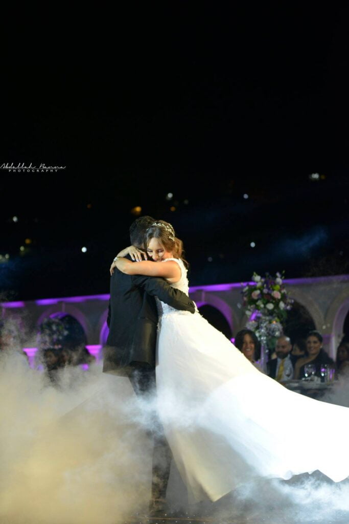 Lebanese wedding couple bride and groom hugging each other on the first dance