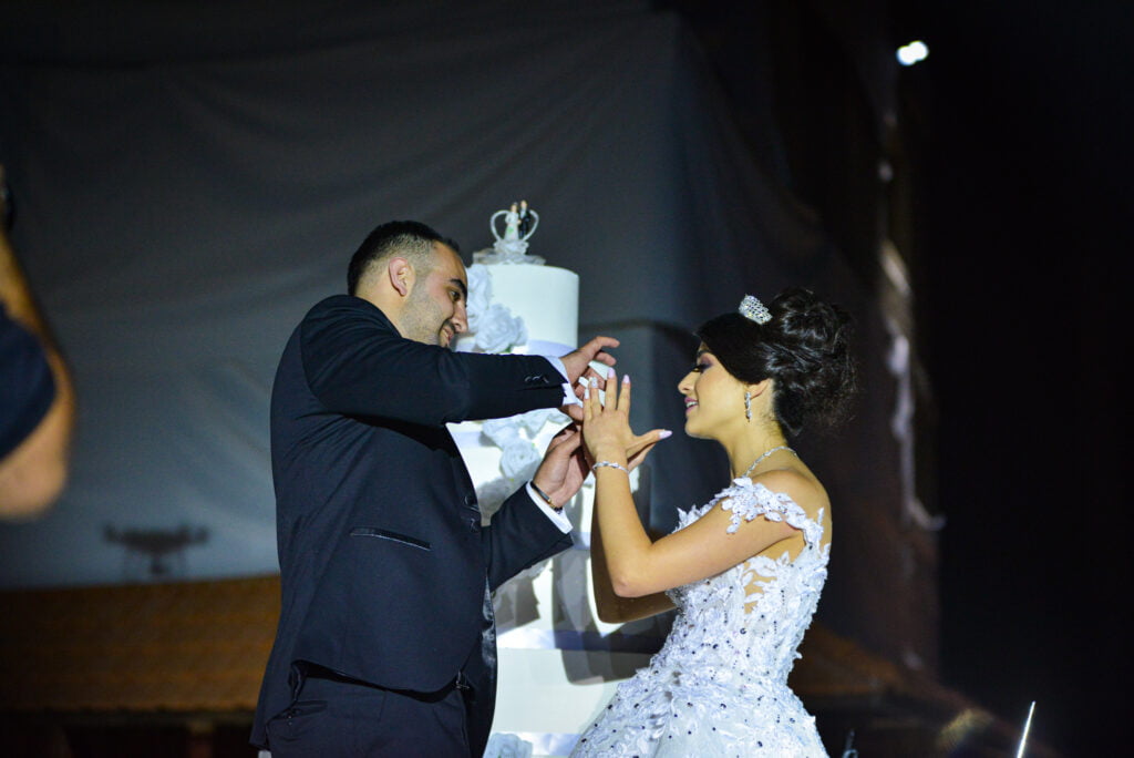 Bride and groom exchanging rings 