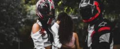 couple riding a motorcycle during a photoshoot