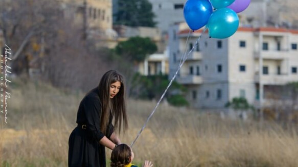 a young mother with her child during a family photography session