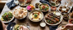A vibrant spread of traditional Lebanese cuisine on a rustic dining table.